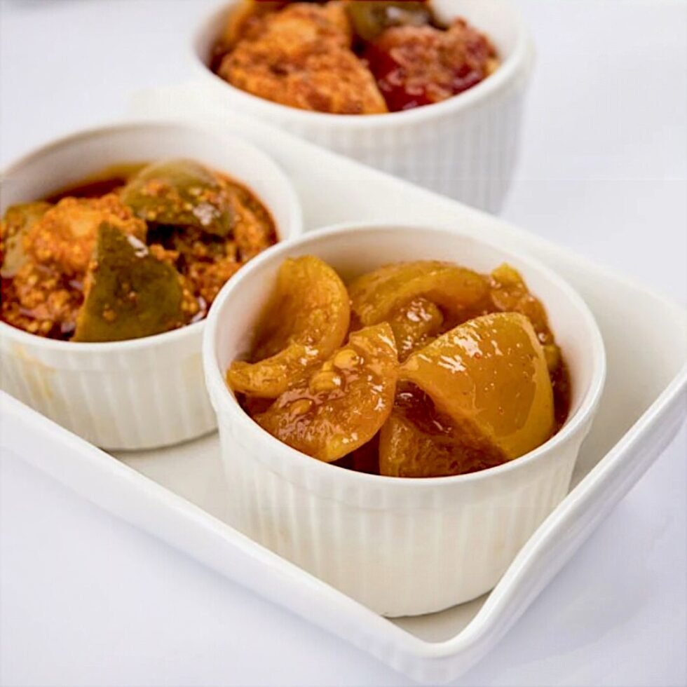 Homemade Galgal pickle (Himachali lemon achaar) in a traditional jar, made from mountain citrus fruits using local spices – tangy, spicy, and handcrafted in Himachal