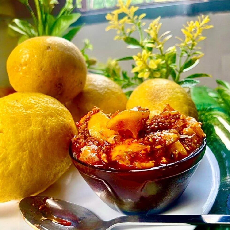 Homemade Galgal pickle (Himachali lemon achaar) in a traditional jar, made from mountain citrus fruits using local spices – tangy, spicy, and handcrafted in Himachal