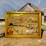 Handcrafted bamboo wall art showing Himachal village life made by women artisans