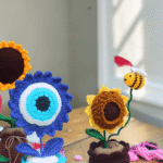Handmade crochet sunflower and evil eye flower pot combo Himachal