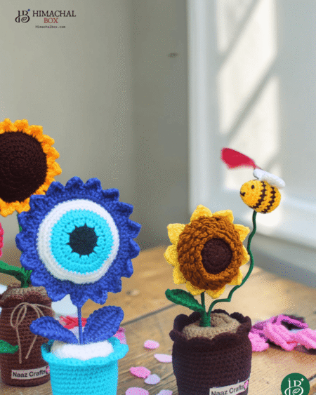 Handmade crochet sunflower and evil eye flower pot combo Himachal