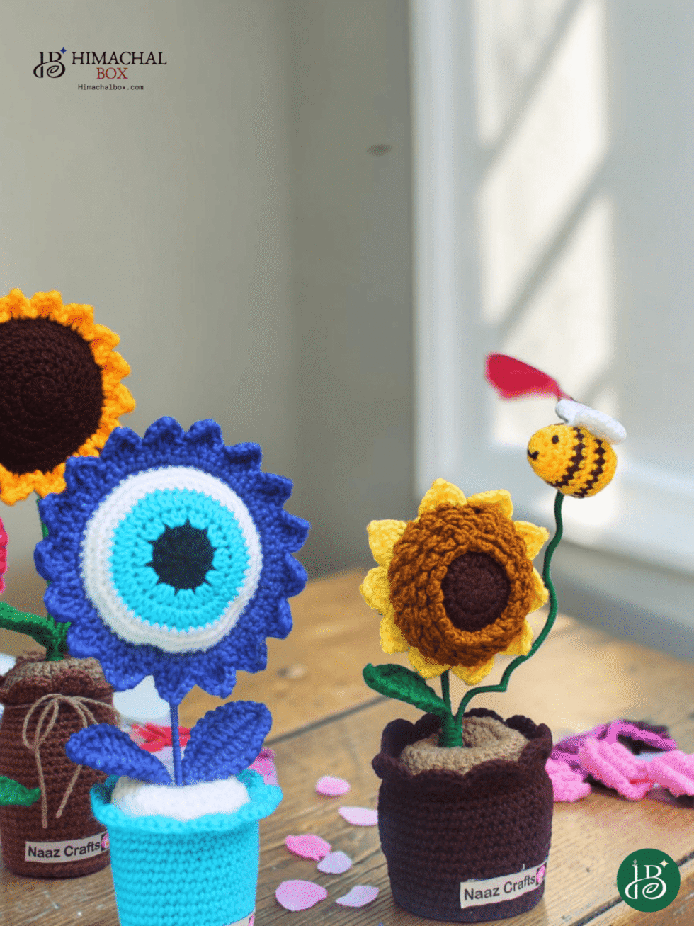 Handmade crochet sunflower and evil eye flower pot combo Himachal